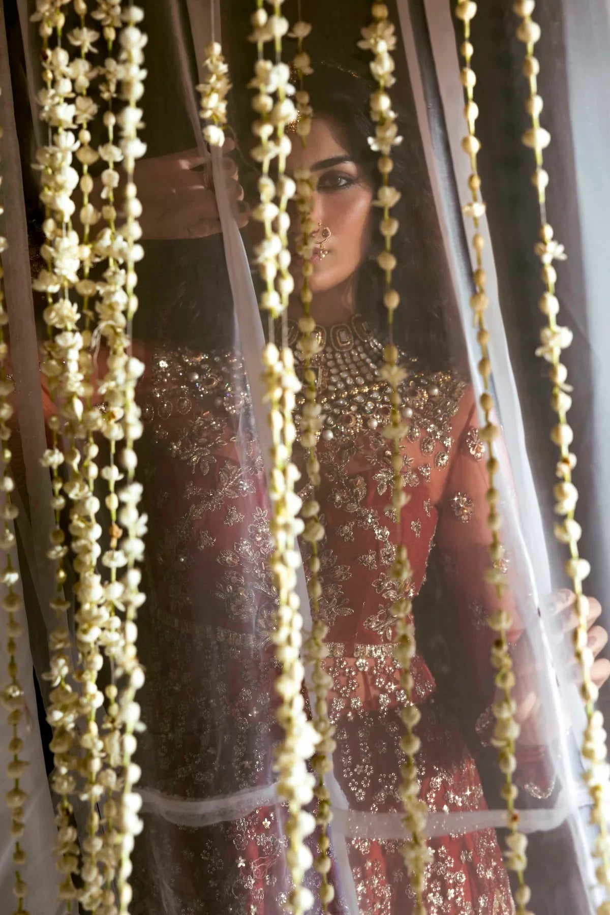 Akbar Aslam Embroidered Net Suit Marjaan